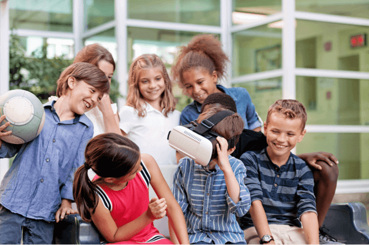 kids are learning how to use VR device